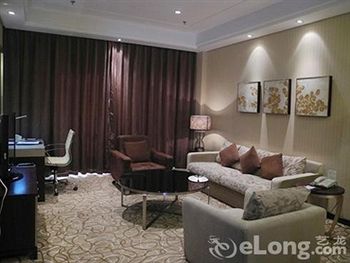 Imagen de la habitación del Hotel Beijing Yulong International. Foto 11