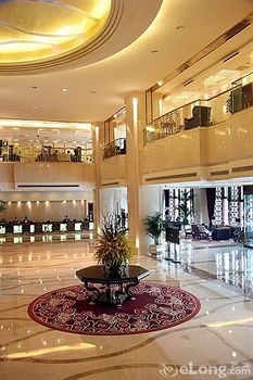 Imagen de los interiores del Hotel Beijing Yulong International. Foto 14