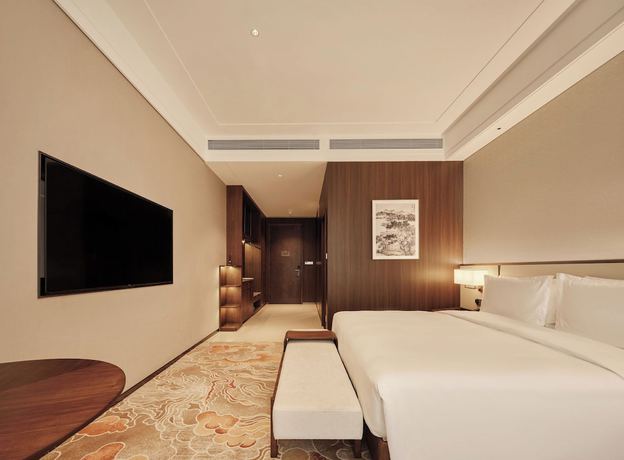 Imagen de la habitación del Hotel Beijing Zhonghe. Foto 4