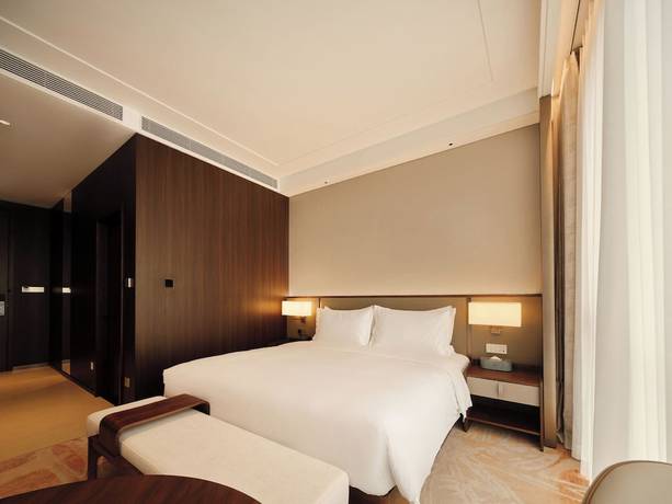 Imagen de la habitación del Hotel Beijing Zhonghe. Foto 5
