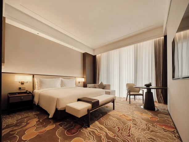 Imagen de la habitación del Hotel Beijing Zhonghe. Foto 9