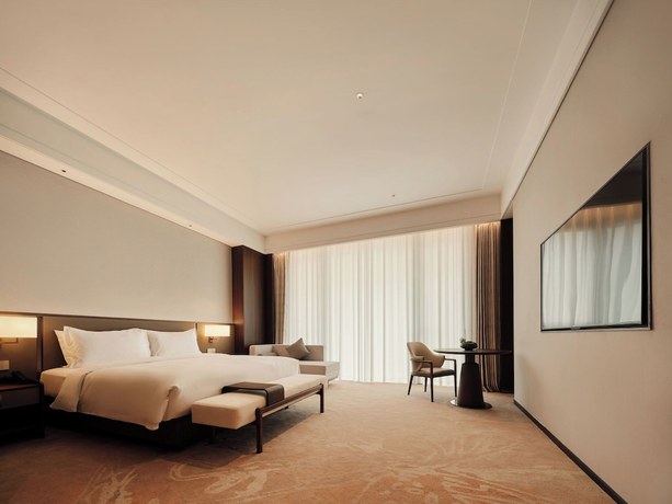 Imagen de la habitación del Hotel Beijing Zhonghe. Foto 12