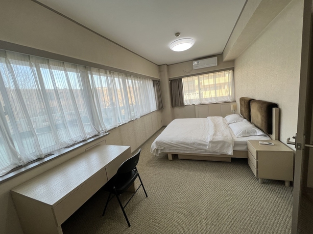 Imagen de la habitación del Hotel Beijingjiuxiangongyu. Foto 7