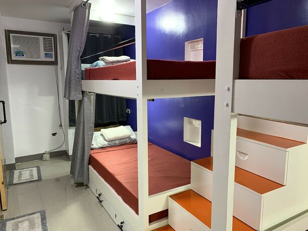 Imagen de la habitación del Hotel Beinte Singko de Marso Apartments. Foto 15