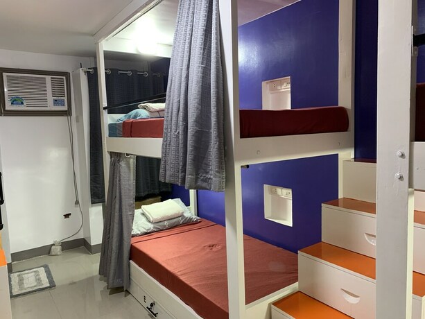 Imagen de la habitación del Hotel Beinte Singko de Marso Apartments. Foto 24