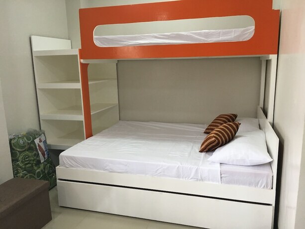 Imagen de la habitación del Hotel Beinte Singko de Marso Apartments. Foto 25