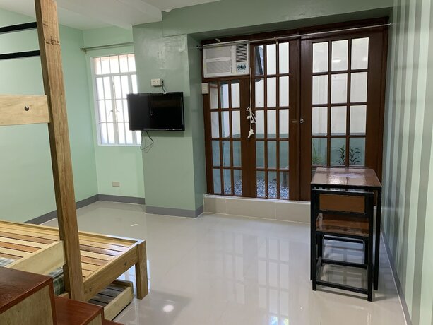 Imagen de la habitación del Hotel Beinte Singko de Marso Apartments. Foto 26