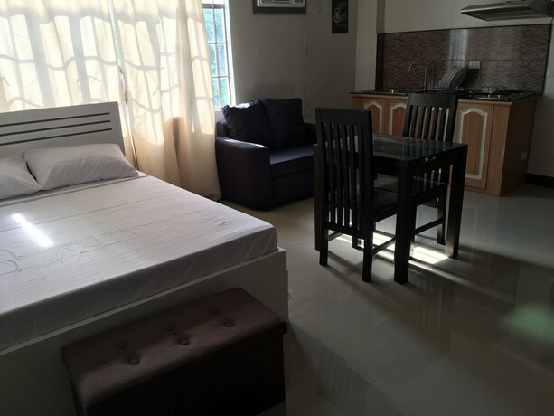 Imagen de la habitación del Hotel Beinte Singko de Marso Apartments. Foto 27