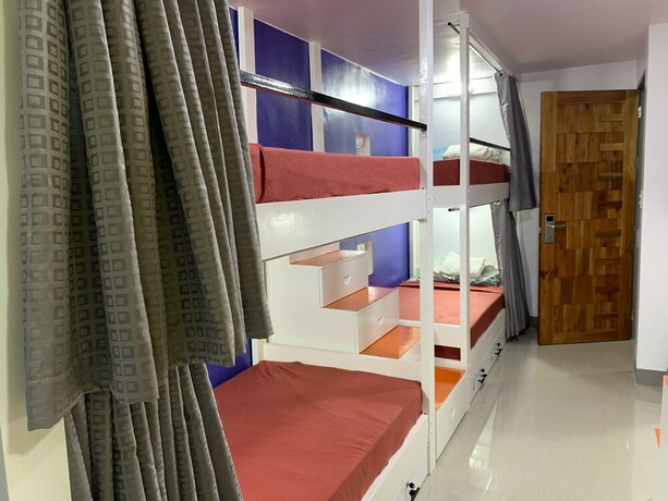 Imagen de la habitación del Hotel Beinte Singko de Marso Apartments. Foto 31