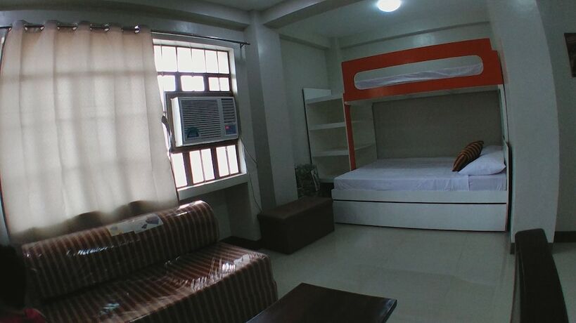 Imagen de la habitación del Hotel Beinte Singko de Marso Apartments. Foto 32