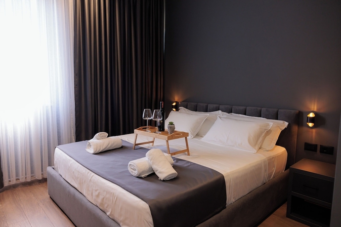 Imagen de la habitación del Hotel Bel Ami Tirana. Foto 2