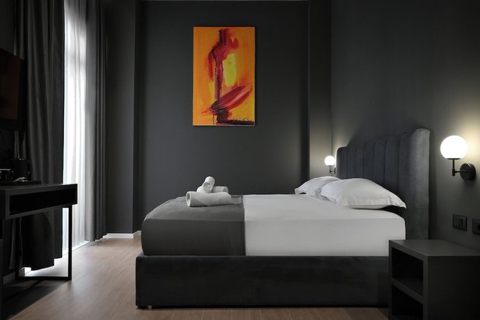 Imagen de la habitación del Hotel Bel Ami Tirana. Foto 4