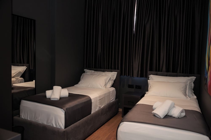 Imagen de la habitación del Hotel Bel Ami Tirana. Foto 6