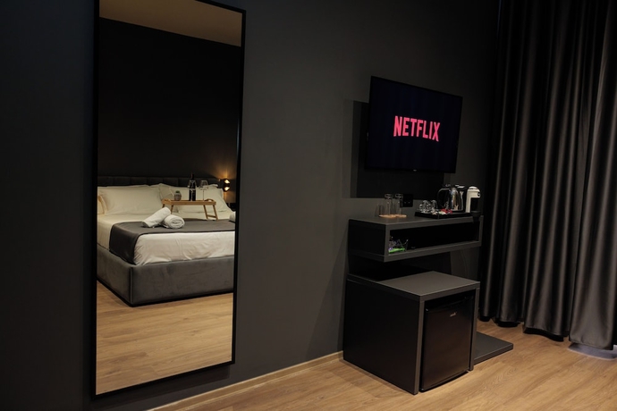Imagen de la habitación del Hotel Bel Ami Tirana. Foto 10