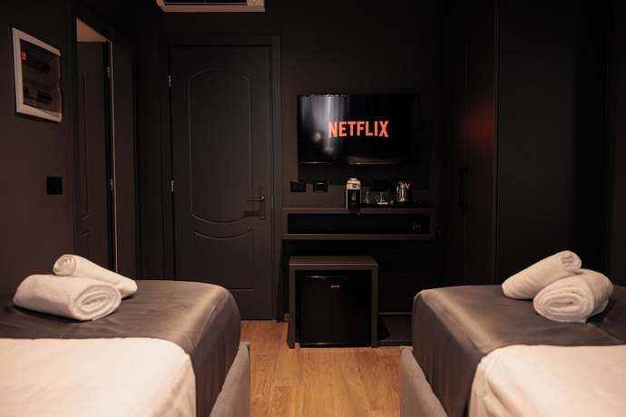 Imagen de la habitación del Hotel Bel Ami Tirana. Foto 12
