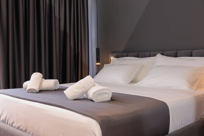 Imagen de la habitación del Hotel Bel Ami Tirana. Foto 16