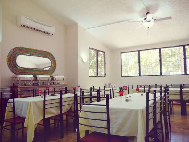 Imagen del bar/restaurante del Hotel Bel Fle Missions. Foto 6