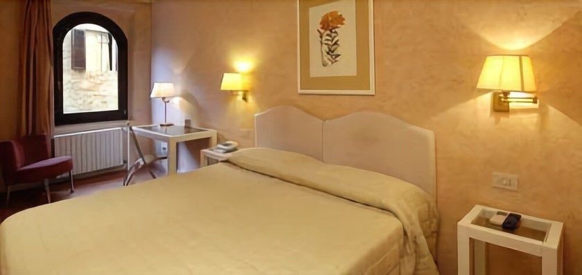 Imagen de la habitación del Hotel Bel Soggiorno, Santa Chiara. Foto 5