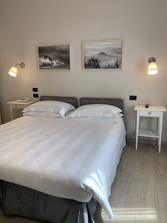 Imagen de la habitación del Hotel Bel Soggiorno, Santa Chiara. Foto 7