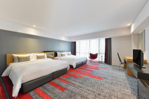 Imagen de la habitación del Hotel Belaire Bangkok Sukhumvit. Foto 7