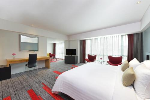 Imagen de la habitación del Hotel Belaire Bangkok Sukhumvit. Foto 8