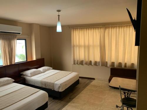 Imagen de la habitación del Hotel Belamar. Foto 15
