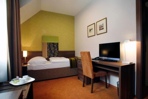 Imagen de la habitación del Hotel Belassi. Foto 6