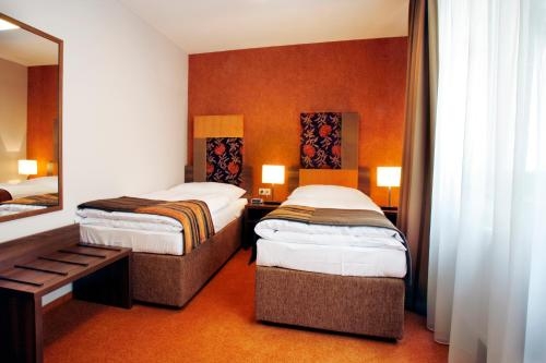 Imagen de la habitación del Hotel Belassi. Foto 7