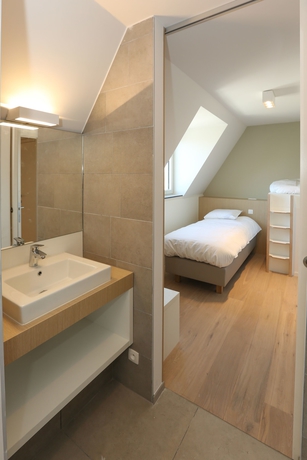 Imagen de la habitación del Hotel Belcasa Family Suites and Lofts. Foto 2