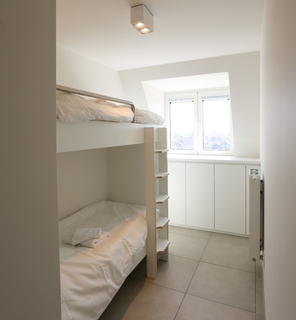 Imagen de la habitación del Hotel Belcasa Family Suites and Lofts. Foto 3