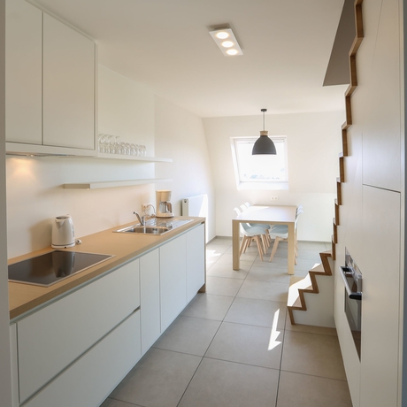 Imagen de la habitación del Hotel Belcasa Family Suites and Lofts. Foto 8