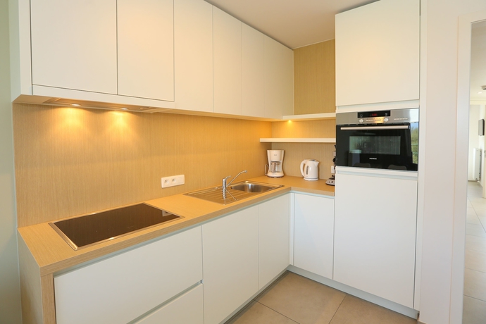 Imagen de la habitación del Hotel Belcasa Family Suites and Lofts. Foto 9