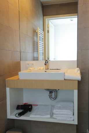 Imagen de la habitación del Hotel Belcasa Family Suites and Lofts. Foto 12