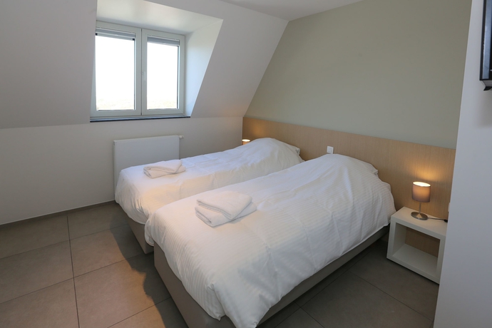 Imagen de la habitación del Hotel Belcasa Family Suites and Lofts. Foto 15