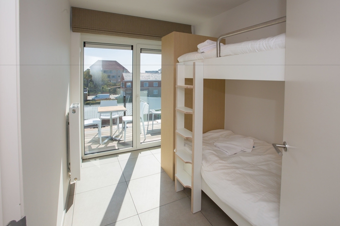 Imagen de la habitación del Hotel Belcasa Family Suites and Lofts. Foto 16