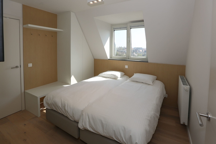 Imagen de la habitación del Hotel Belcasa Family Suites and Lofts. Foto 18