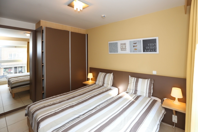 Imagen de la habitación del Hotel Belcasa Suitehotel. Foto 7