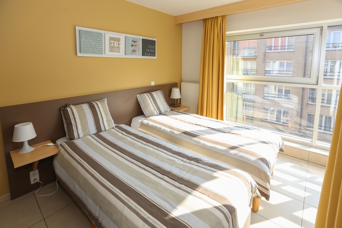 Imagen de la habitación del Hotel Belcasa Suitehotel. Foto 9
