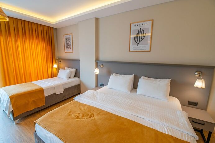 Imagen de la habitación del Hotel Belci City Residence. Foto 16