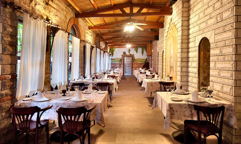 Imagen del bar/restaurante del Hotel Belconti Resort - All Inclusive. Foto 4