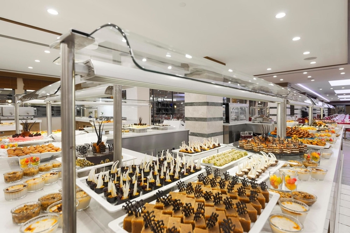 Imagen del bar/restaurante del Hotel Belconti Resort - All Inclusive. Foto 6