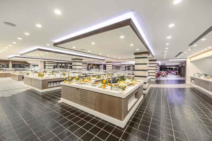 Imagen del bar/restaurante del Hotel Belconti Resort - All Inclusive. Foto 7