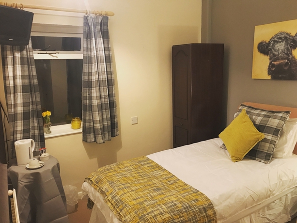 Imagen de la habitación del Hotel Beldon House. Foto 12