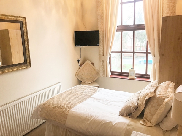 Imagen de la habitación del Hotel Beldon House. Foto 13