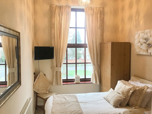 Imagen de la habitación del Hotel Beldon House. Foto 14