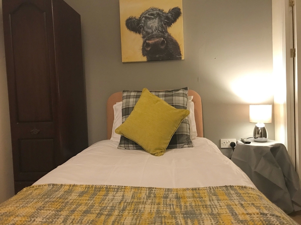 Imagen de la habitación del Hotel Beldon House. Foto 18