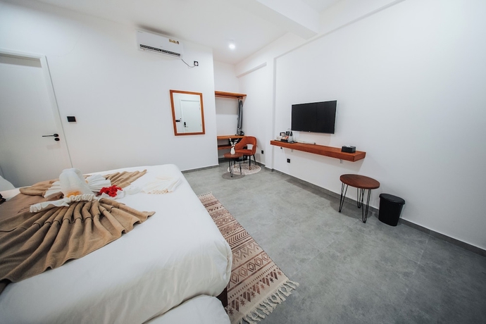 Imagen de la habitación del Hotel Belena Maldives. Foto 9