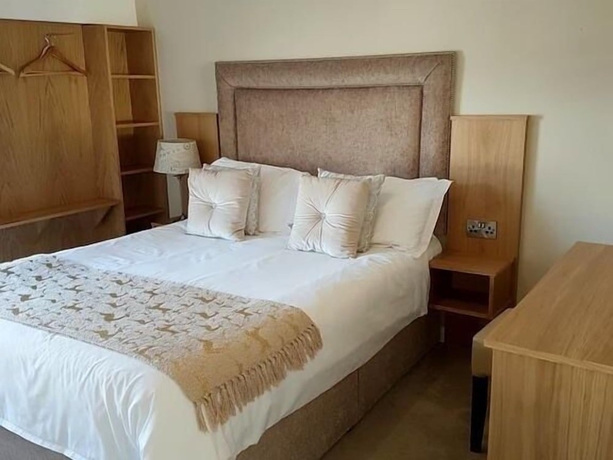 Imagen de la habitación del Hotel Belfast House. Foto 9