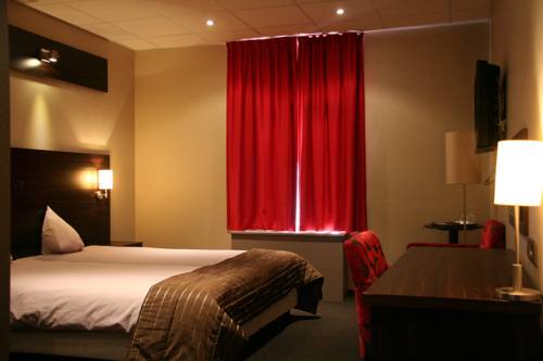 Imagen de la habitación del Hotel Belfleur. Foto 13