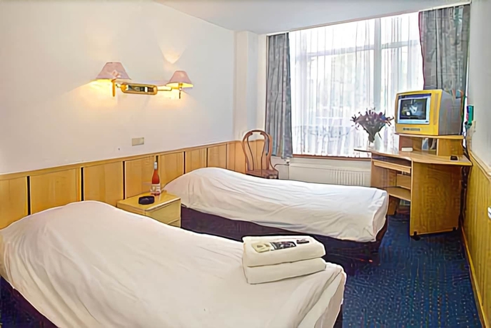 Imagen de la habitación del Hotel Belfort, Ámsterdam. Foto 14